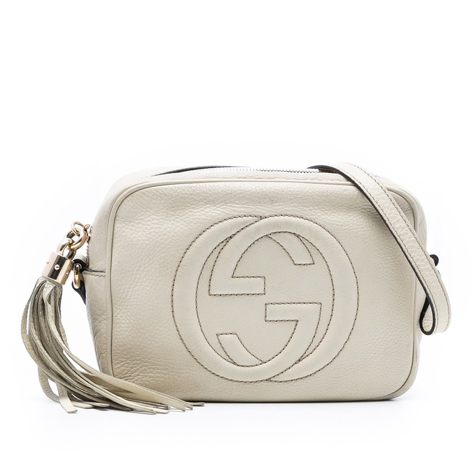 White Gucci Soho Disco Leather Crossbody Bag with Tassel Accent: White Gucci Soho Disco Leather Crossbody Bag with Tassel Accent This Gucci Soho Disco Crossbody features a white leather body with a signature tassel detail and an adjustable flat leather strap. The b
