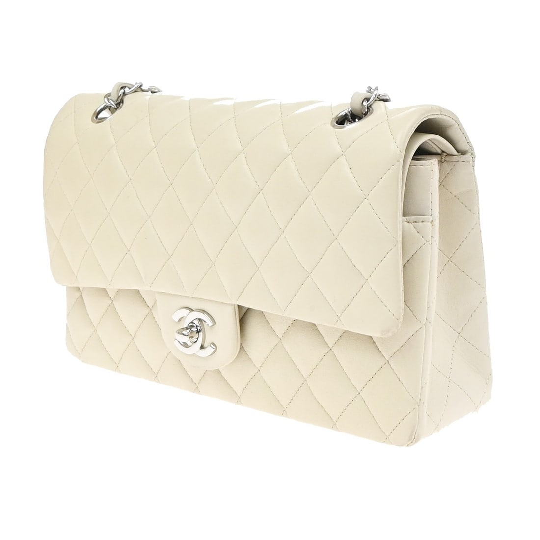 Chanel Vintage Classic Double Flap White Caviar Leather Bag: Chanel Vintage Classic Double Flap White Caviar Leather Bag Chanel Vintage Classic Double Flap bag in white leather with a quilted design. Made in France, this female-style handbag measures 25 cm x 15