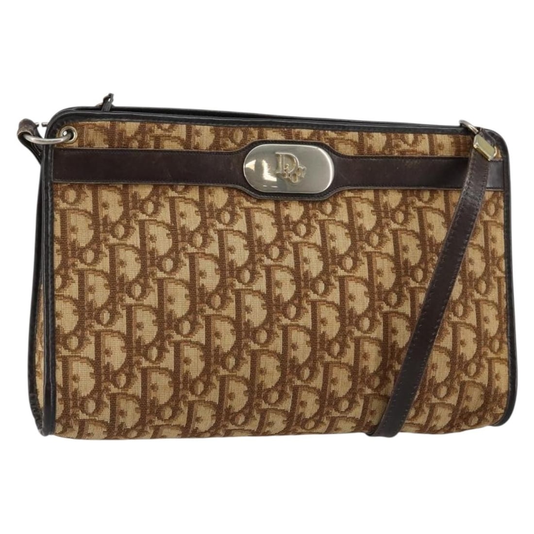 Christian Dior Vintage Trotter Brown Canvas Shoulder Bag: Christian Dior Vintage Trotter Brown Canvas Shoulder Bag This Christian Dior Vintage Trotter Shoulder Bag is crafted from brown canvas and designed for women. It features a shoulder strap and leather 