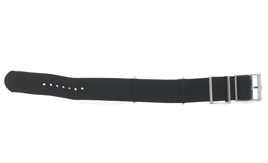 TUDOR 22MM Black Nylon Wristwatch Band: TUDOR 22MM Black Nylon Wristwatch Band Pre-owned TUDOR wristwatch band in black nylon. Made in Switzerland, this strap offers a straightforward replacement or accessory option for a compatible watch. 