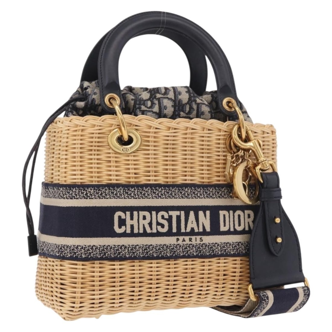 Christian Dior Lady Dior Medium handbag in navy beige Oblique jacquard: Christian Dior Lady Dior Medium handbag in navy beige Oblique jacquard Christian Dior Lady Dior medium handbag in navy and beige Oblique jacquard with rattan construction. Made in Italy, this women's 