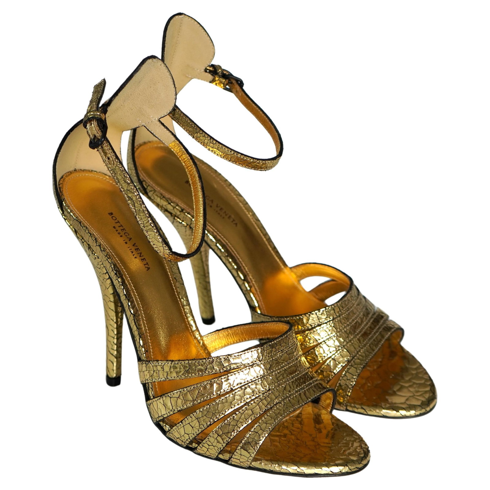 Bottega Veneta metallic gold sandals size 40.5: Bottega Veneta metallic gold sandals size 40.5 Bottega Veneta metallic gold heeled sandals in excellent condition. Marked EU size 40.5, these 21st century sandals feature a high heel and do not includ