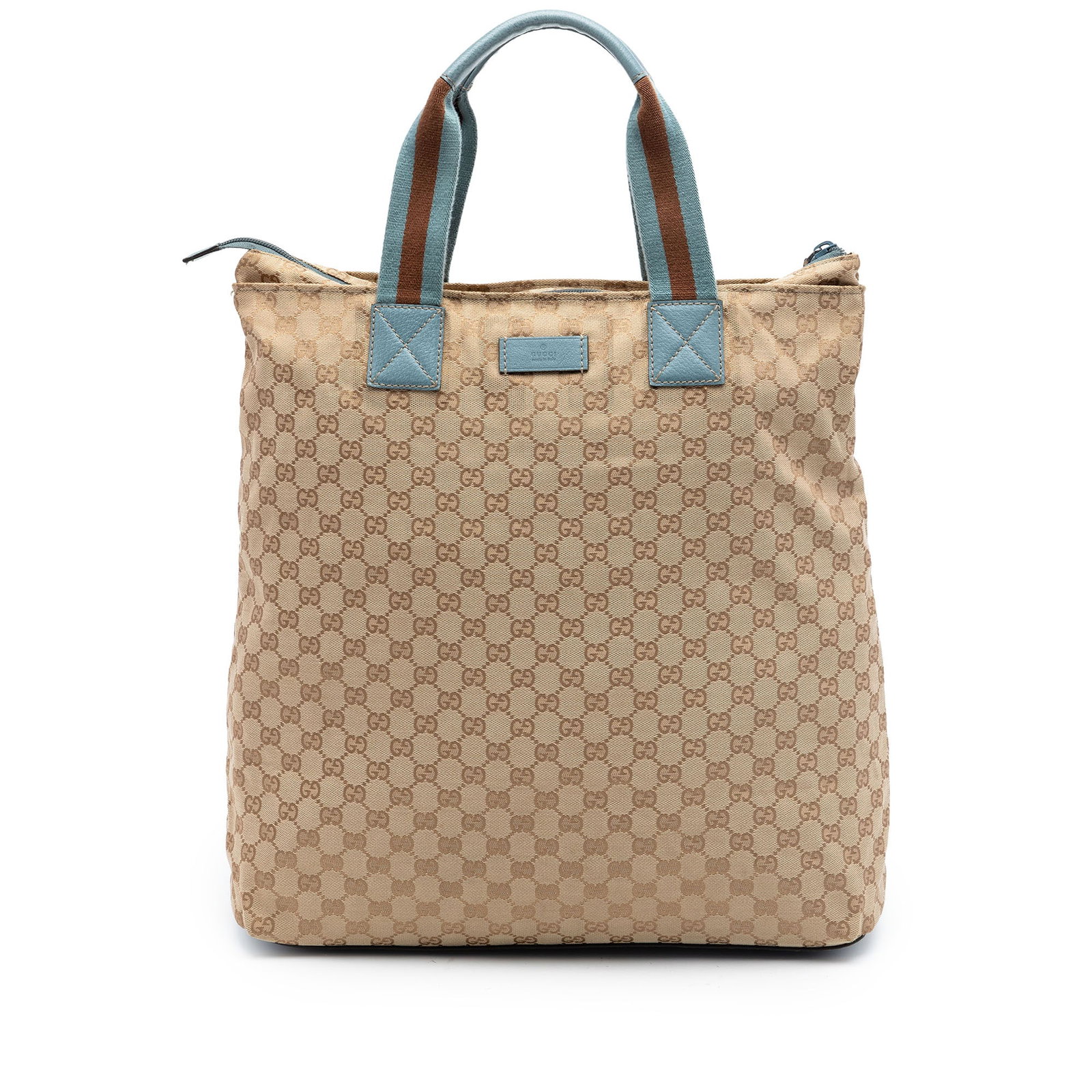Gucci GG Canvas Tote Bag with Web Straps and Leather Trim: Gucci GG Canvas Tote Bag with Web Straps and Leather Trim Gucci GG Canvas Web Vertical Tote crafted with a canvas body and leather trim. The bag features flat leather handles with web strap details, a