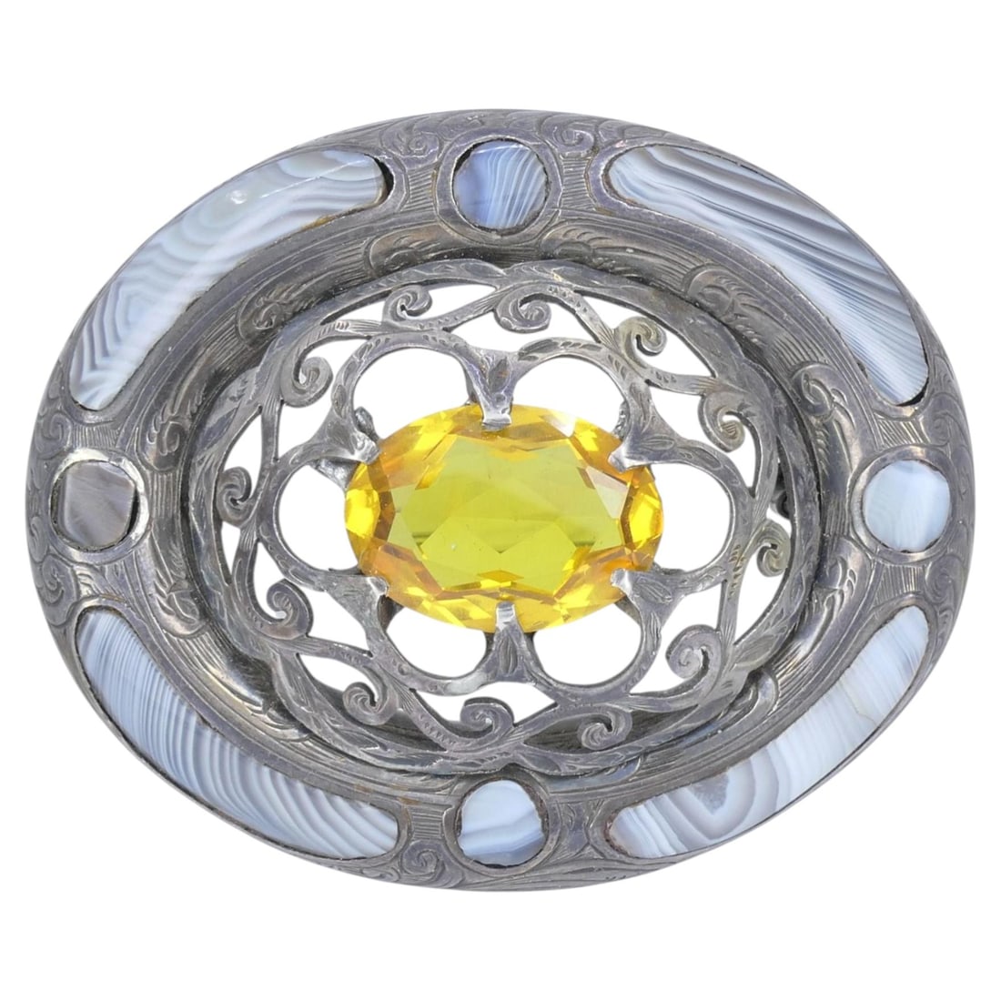 Late 19th Century Scottish Agate Sterling Silver Brooch Pendant: Late 19th Century Scottish Agate Sterling Silver Brooch Pendant Antique Victorian sterling silver brooch pendant featuring agate cabochon panels and a faceted yellow center stone, likely period glass.