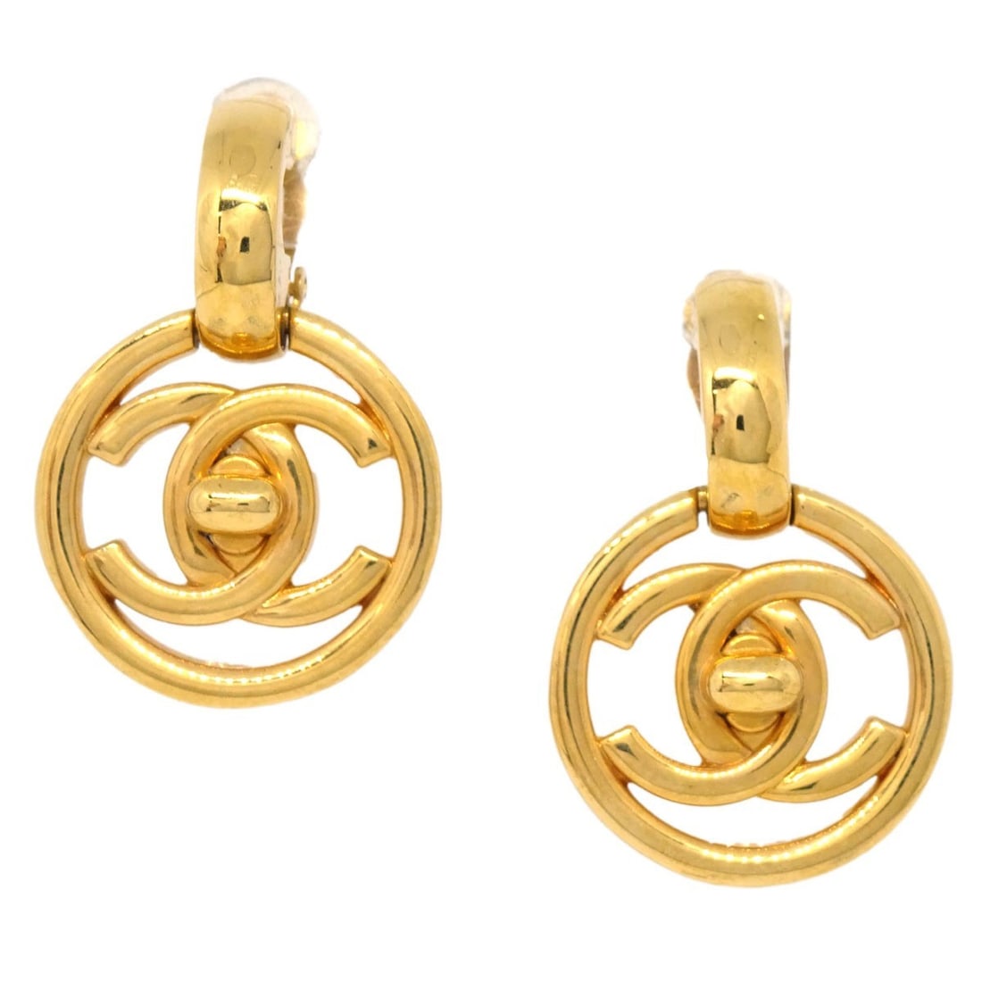 CHANEL 97P Gold Plated Clip On Dangle Earrings: CHANEL 97P Gold Plated Clip On Dangle Earrings Chanel clip-on dangle earrings in gold-plated metal with a round button-style design and turnlock detail. Made in France, this pair comes with its box. C