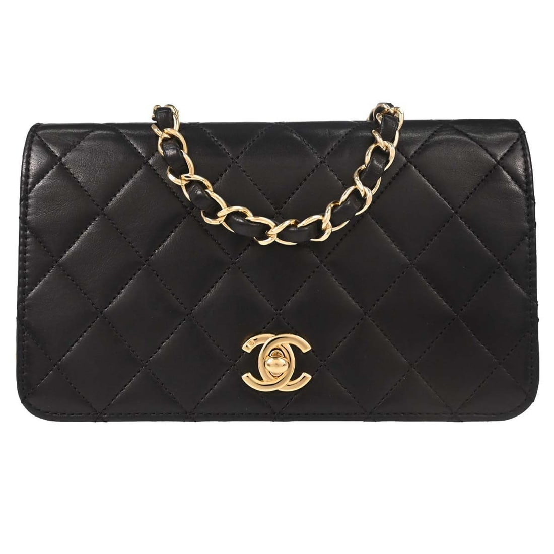 Chanel Full Flap Mini Shoulder Bag in Black Lambskin: Chanel Full Flap Mini Shoulder Bag in Black Lambskin Chanel Full Flap mini shoulder bag in black quilted lambskin leather with a turn lock flap closure and single chain crossbody strap. The bag featur