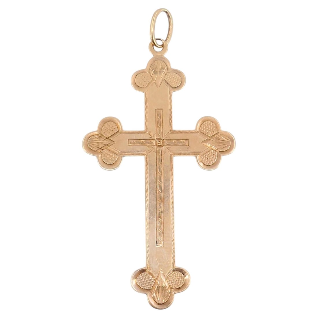 Victorian Edwardian 14k Rose Gold Cross Pendant with Engraved Detail: Victorian Edwardian 14k Rose Gold Cross Pendant with Engraved Detail Antique 14k rose gold cross pendant with an engraved design, trefoil-shaped ends, and a raised cross motif through the center. The 