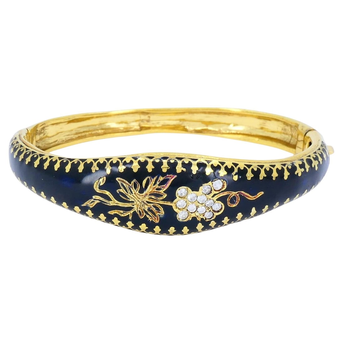 Victorian hinged 14k yellow gold bangle with enamel diamond grapevine: Victorian hinged 14k yellow gold bangle with enamel diamond grapevine Victorian hinged bracelet crafted in 14k yellow gold with black enamel and diamond accents, featuring a grape vine motif. The top 