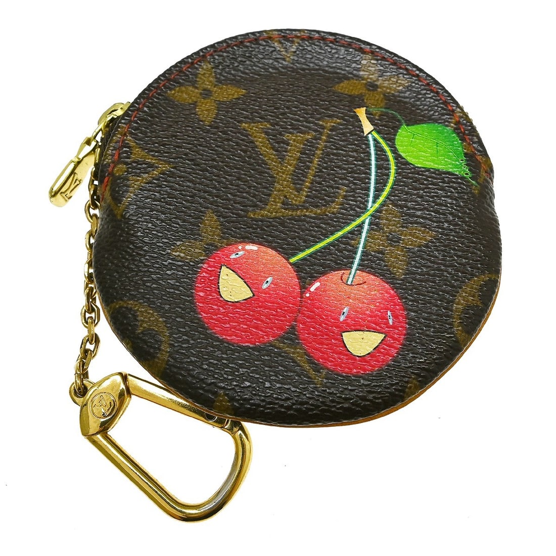 Louis Vuitton M95043 Porte Monnaie Rond Monogram coin purse: Louis Vuitton M95043 Porte Monnaie Rond Monogram coin purse Louis Vuitton Porte Monnaie Rond coin case wallet in brown Monogram Cherry canvas with leather trim. This women's coin purse features a zip-