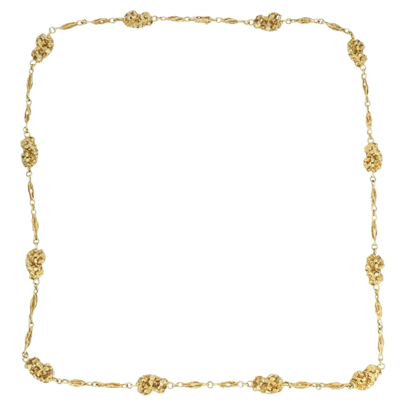 Van Cleef Arpels Nugget Link Necklace in 18k Gold 30in: Van Cleef Arpels Nugget Link Necklace in 18k Gold 30in Vintage Van Cleef & Arpels 18k gold nuggets chain necklace featuring a series of textured nugget-style links spaced along a delicate chain. The p