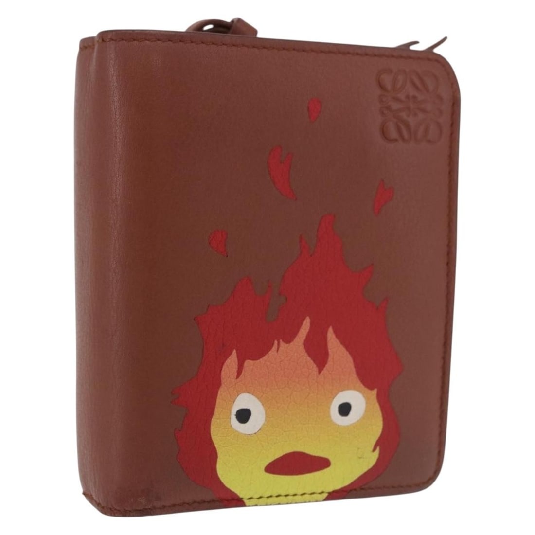 LOEWE Studio Ghibli Calcifer Anagram Leather Wallet Brown Gold: LOEWE Studio Ghibli Calcifer Anagram Leather Wallet Brown Gold LOEWE x Studio Ghibli Anagram Calcifer wallet in brown and gold leather. Made in Spain, this women's wallet includes the dust bag and ite