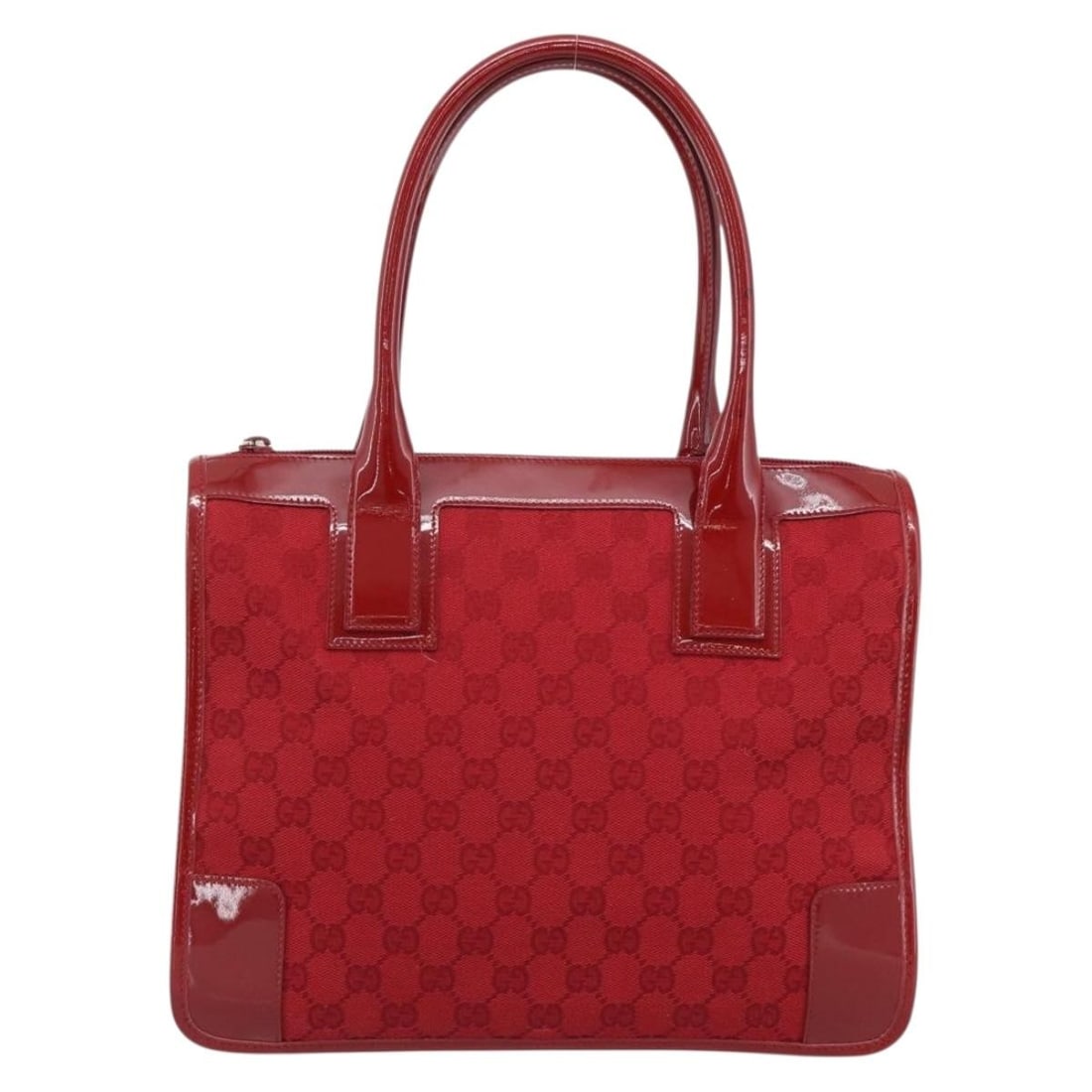 Gucci Structured Open Tote Top Handle Canvas Handbag: Gucci Structured Open Tote Top Handle Canvas Handbag Structured top handle open tote by Gucci in red canvas with white leather trim. The bag is in very good condition with light wear on the exterior, 