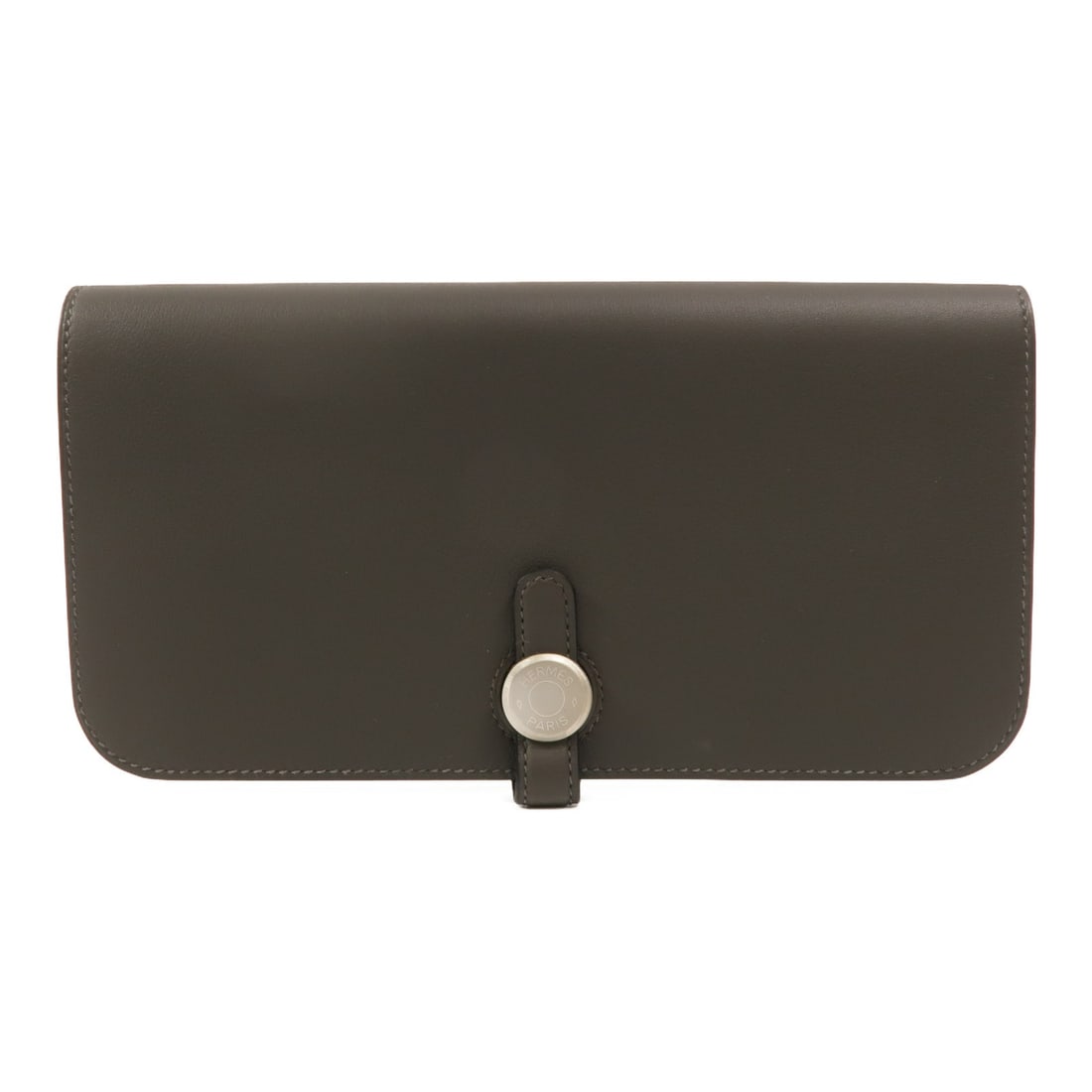 Hermes Dogon bifold wallet in Ardoise Veau Swift calfskin: Hermes Dogon bifold wallet in Ardoise Veau Swift calfskin Hermes Dogon long wallet in Veau Swift leather with palladium-tone hardware and an Ardoise gray finish. This bifold design features a flap clo