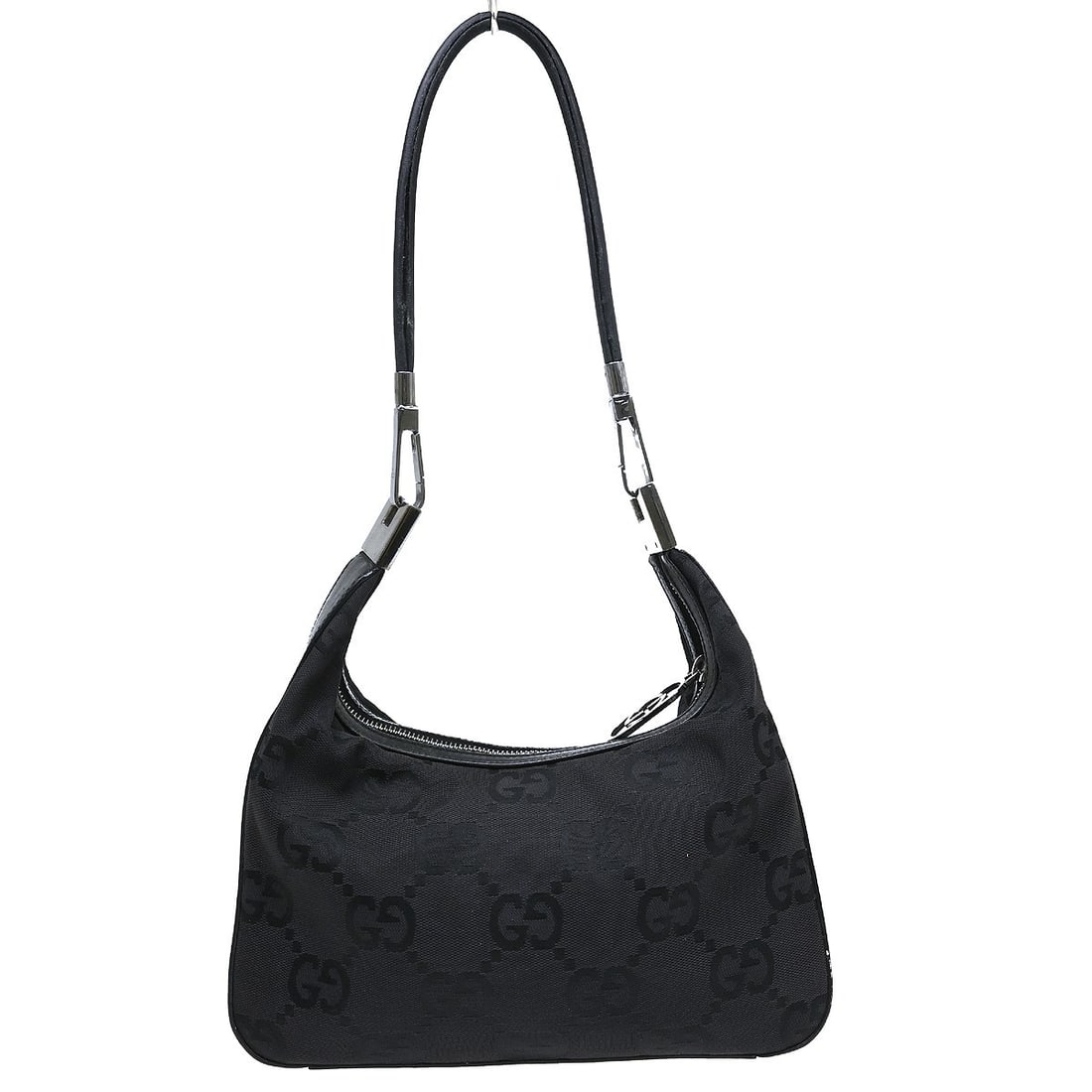 Gucci GG Medium Zip Handbag in Black Canvas and Leather: Gucci GG Medium Zip Handbag in Black Canvas and Leather Vintage Gucci GG handbag in black canvas with leather trim and a zip closure. This medium handbag features the Gucci GG pattern, black lining, a