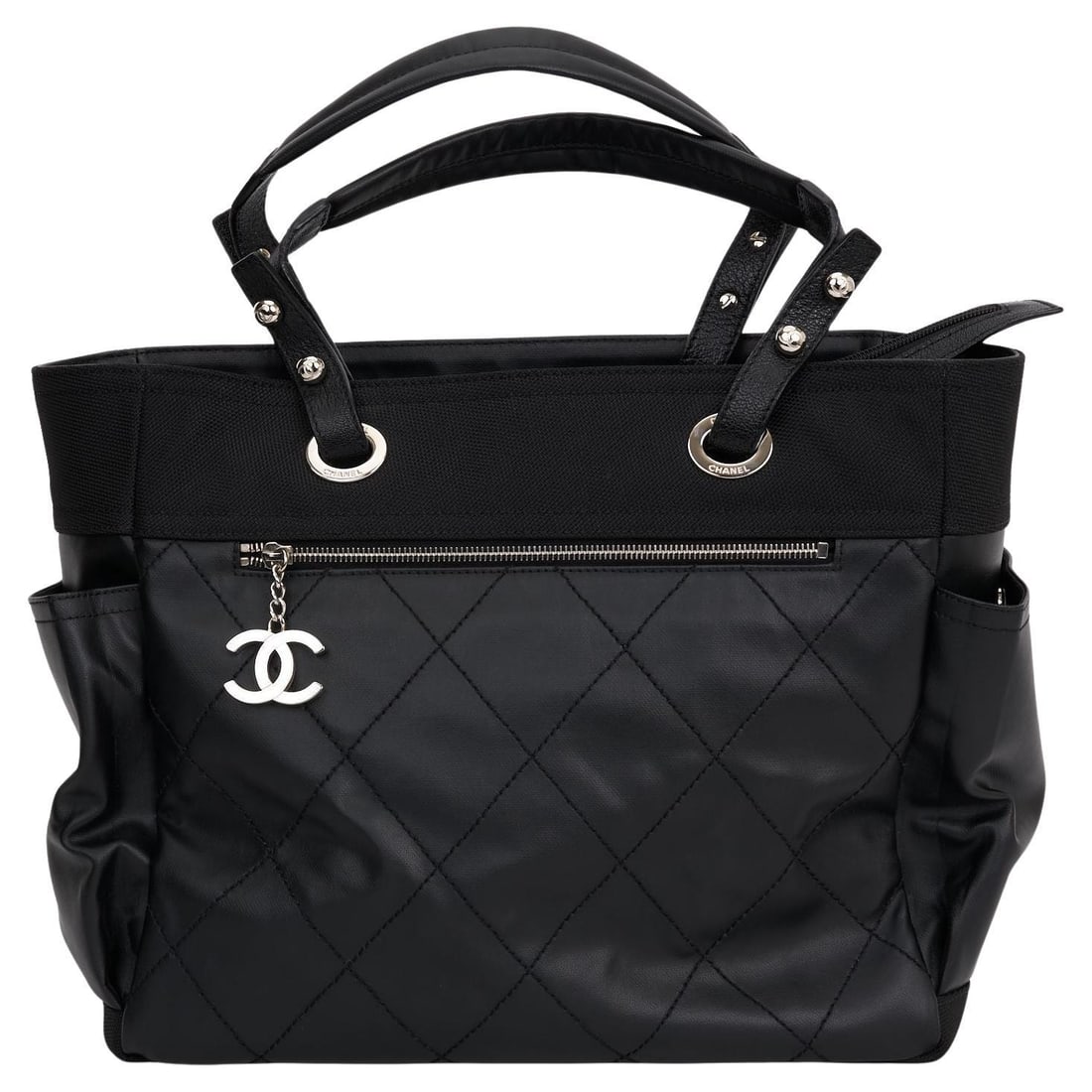 Chanel Black Quilted Coated Canvas Paris Biarritz Tote with Pouch: Chanel Black Quilted Coated Canvas Paris Biarritz Tote with Pouch Introducing the Chanel Black Quilted Paris Biarritz Tote, a stylish and functional accessory for any fashion enthusiast. This tote is 