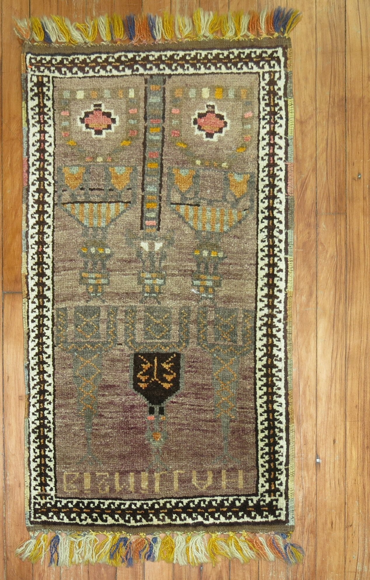 1' 9" x 3' Anatolian Yastik Mini Rug Mid 20th Century: 1' 9" x 3' Anatolian Yastik Mini Rug Mid 20th Century Vintage Anatolian tribal yastik rug from the mid 20th century. This pre-owned mini size rug features a traditional tribal design. Specifications T