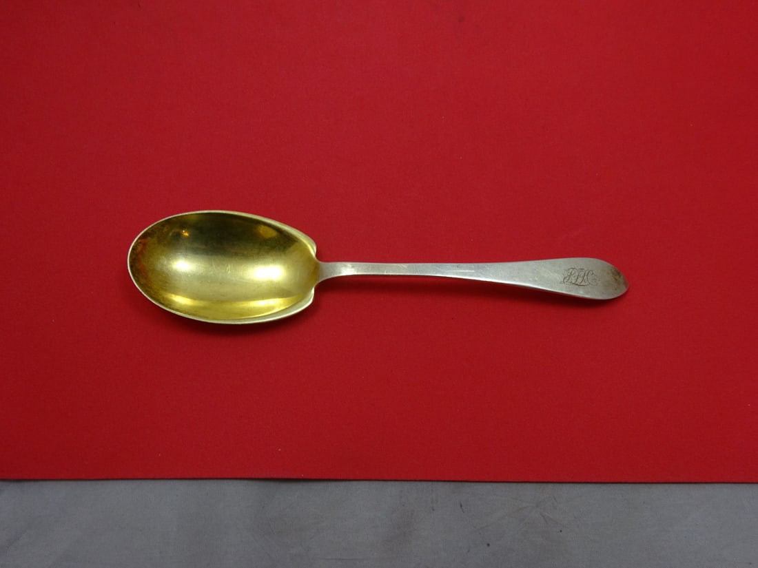 Tiffany Co Faneuil Sterling Silver Serving Spoon Goldwashed 7 1/4": Tiffany Co Faneuil Sterling Silver Serving Spoon Goldwashed 7 1/4" A Tiffany & Co. Faneuil sterling silver preserve spoon with a goldwashed bowl and a plain handle. It is not monogrammed and is in exc