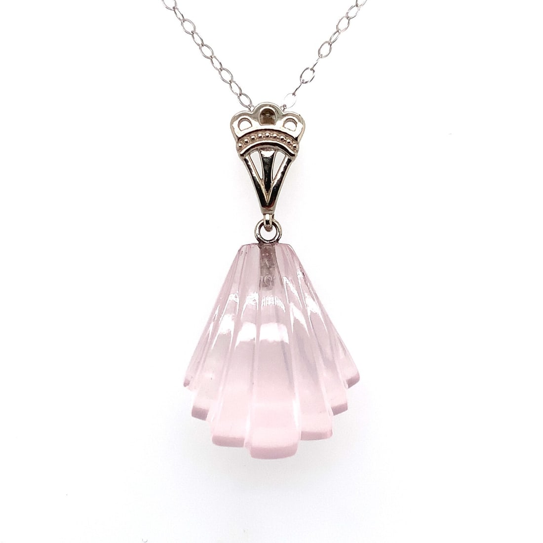 Art Deco 14k White Gold Rose Quartz Pendant with Chain: Art Deco 14k White Gold Rose Quartz Pendant with Chain This stunning Art Deco Inspired pendant is crafted from 14k white gold and features a genuine natural rose quartz stone. The pendant showcases a 