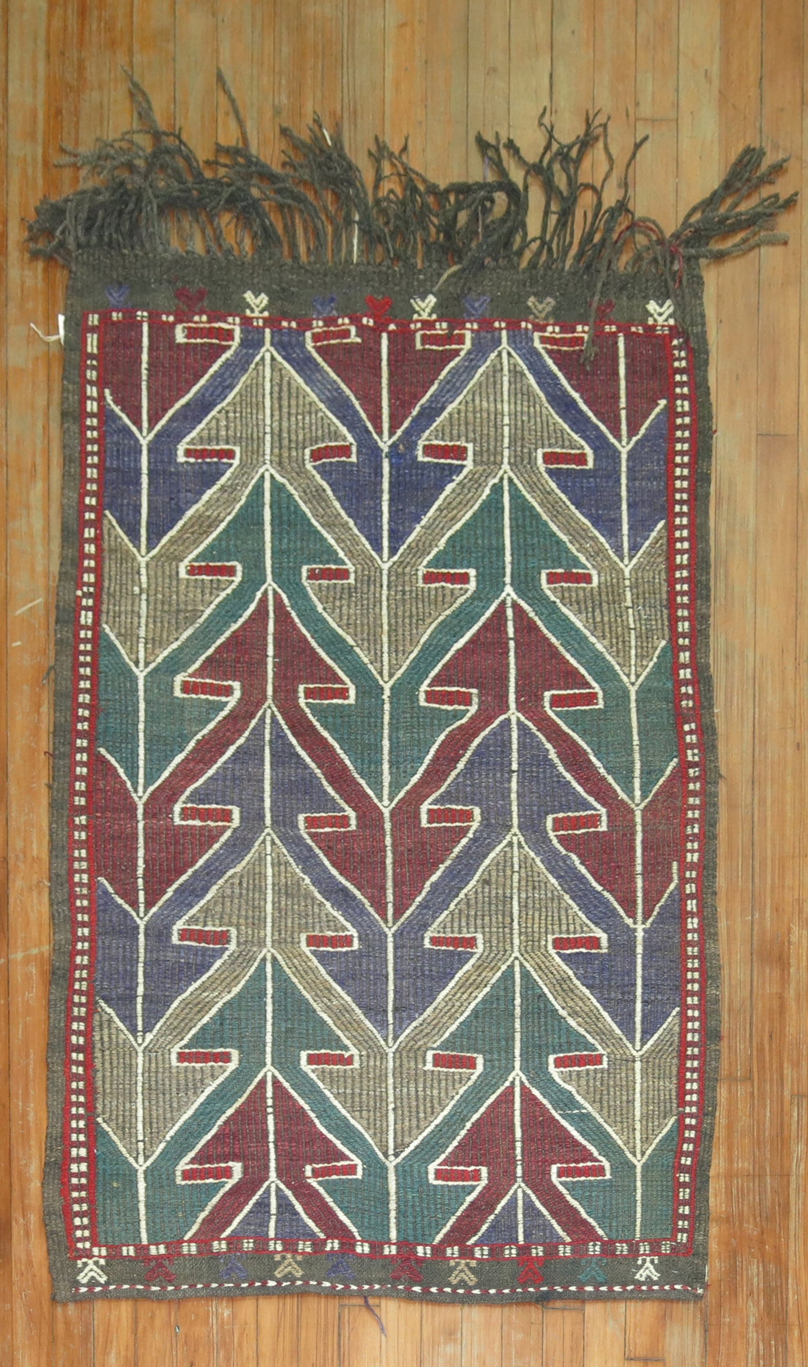 3' x 4' 4" Mid 20th Century Turkish Kilim Rug: 3' x 4' 4" Mid 20th Century Turkish Kilim Rug Vintage Turkish Jajim in a scatter size, dating to the mid-20th century. This pre-owned small kilim features a woven geometric design with stylized leaf m