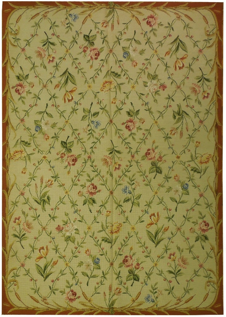 5' x 7' Handmade Needlepoint Flat Weave Area Rug in Ivory Green Rose: 5' x 7' Handmade Needlepoint Flat Weave Area Rug in Ivory Green Rose Free continental US Shipping The 5' x 7' Needlepoint Flat Weave Rug is a stunning addition to any home decor, expertly crafted to m