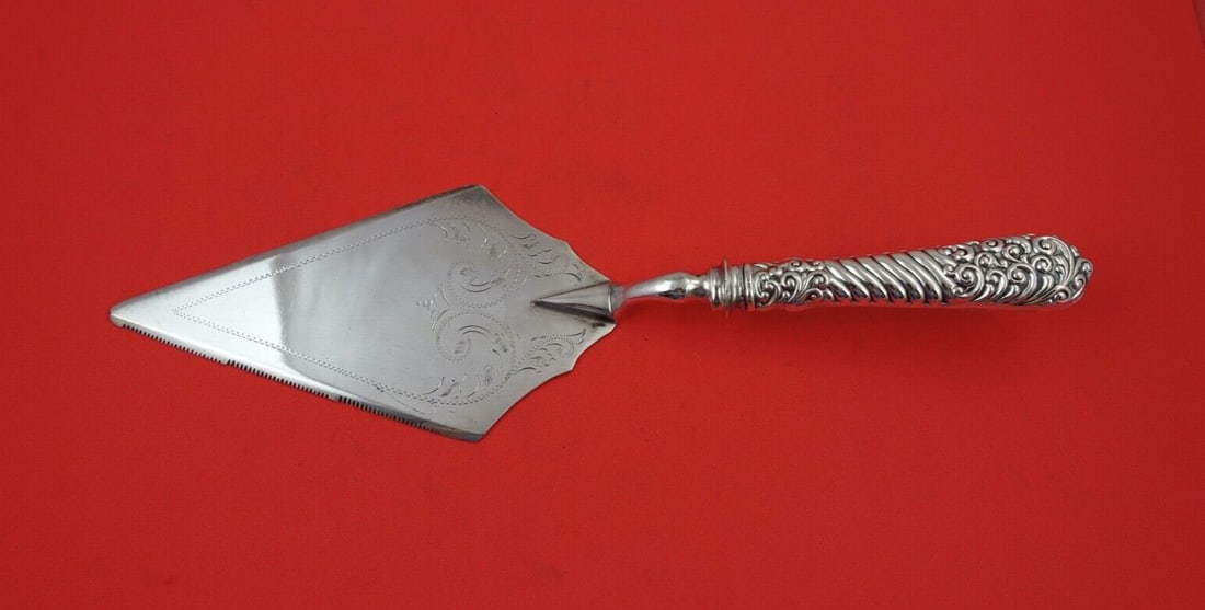 Gorham Number 75 Sterling Silver Pastry Server 11 inch Brite-Cut Blade: Gorham Number 75 Sterling Silver Pastry Server 11 inch Brite-Cut Blade This exquisite pastry server from Gorham features a bright-cut blade, elegantly crafted in sterling silver. The server is part of