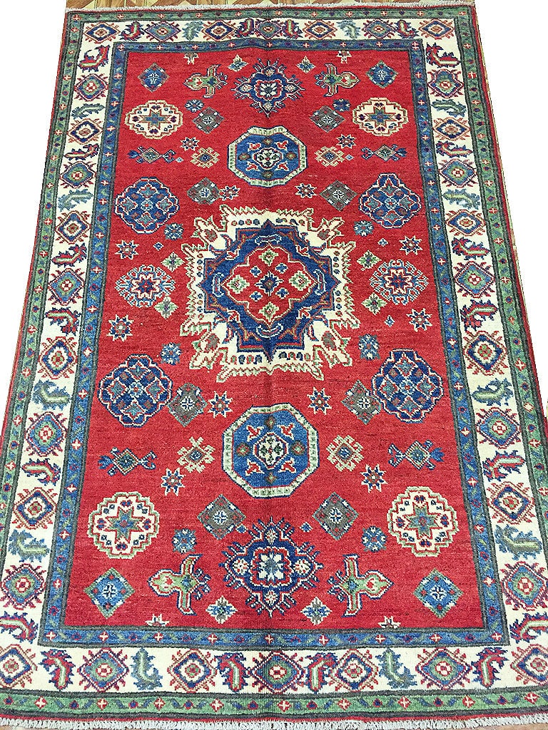 4' x 6' Handmade Afghan Wool Kazak Area Rug Authentic Craftsmanship: 4' x 6' Handmade Afghan Wool Kazak Area Rug Authentic Craftsmanship Free continental US Shipping Enhance your living space with this stunning 4' x 6' Handmade Afghan Wool Kazak Rug. Expertly crafted b