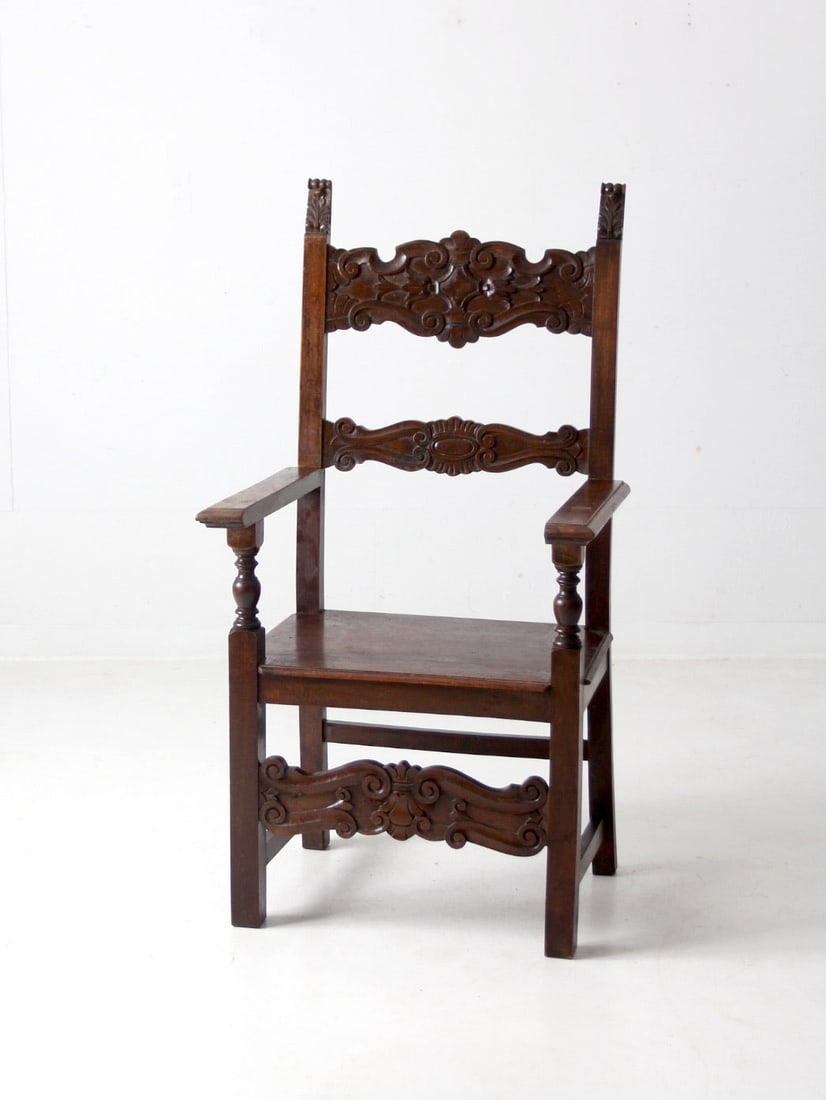 Vintage Italian Renaissance Throne Chair with Carved Detailing: Vintage Italian Renaissance Throne Chair with Carved Detailing This vintage Italian throne chair showcases the elegance of classic Renaissance design. Crafted from wood, it features a rich dark brown 