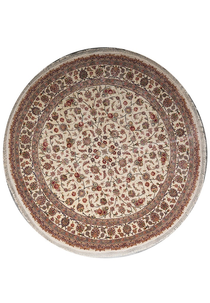 8.3 x 8.3 Handmade Round Wool and Silk Tabriz Area Rug: 8.3 x 8.3 Handmade Round Wool and Silk Tabriz Area Rug Free continental US Shipping This round area rug features a finely hand-knotted construction, crafted from a blend of wool and silk for a soft, l