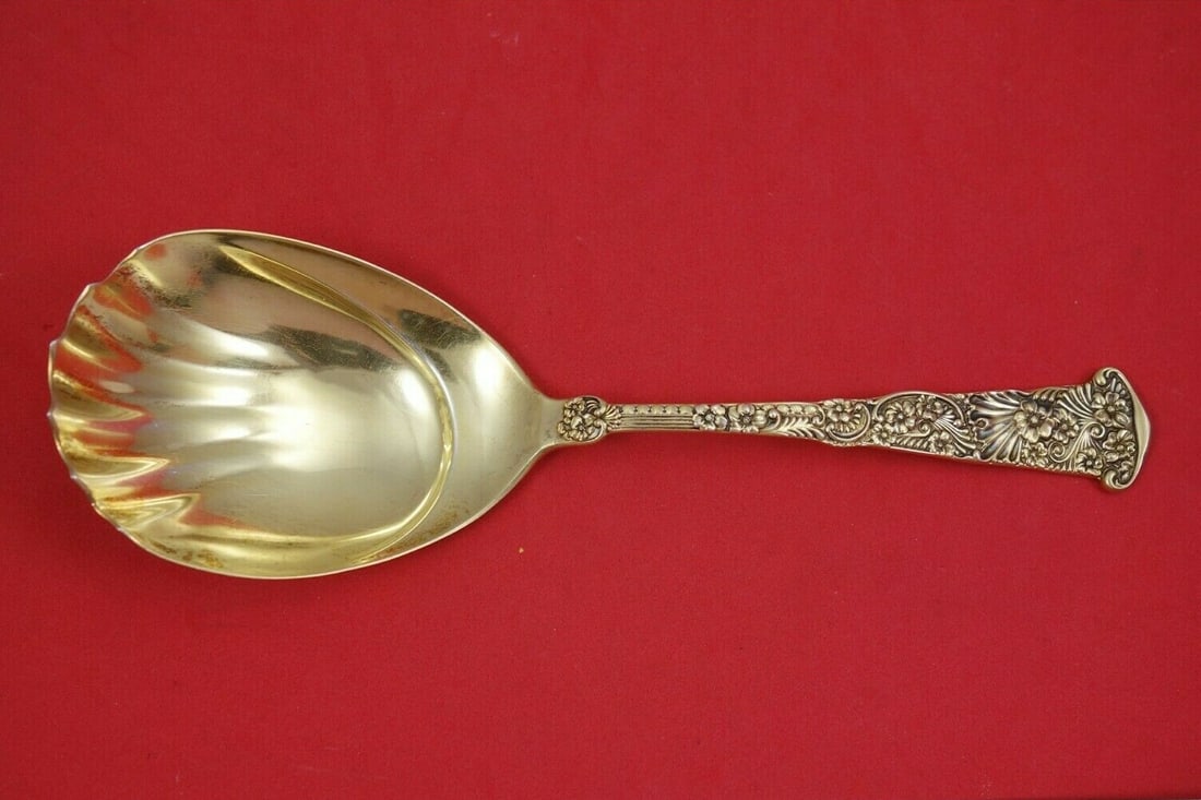 Frank Smith Sterling Silver Vermeil Berry Spoon 7 7/8 in Serving: Frank Smith Sterling Silver Vermeil Berry Spoon 7 7/8 in Serving This exquisite berry spoon is crafted by Frank Smith and made of high-quality sterling silver with a vermeil finish, which means it is 