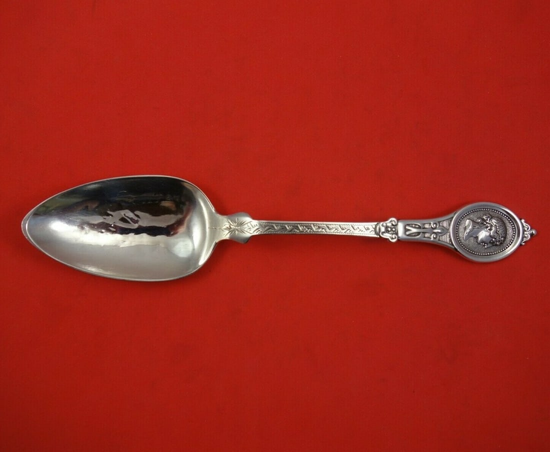 Kidney & Johnson Medallion Sterling Silver Serving Spoon 8.5 Inch: Kidney & Johnson Medallion Sterling Silver Serving Spoon 8.5 Inch This exquisite serving spoon is crafted from sterling silver and features the elegant Medallion pattern by Kidney & Johnson. Measuring