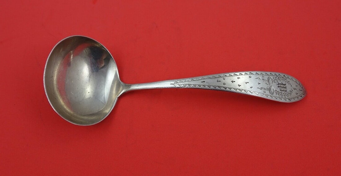 Whiting Colonial A Engraved Sterling Gravy Ladle 7 3/4 Back Stamp: Whiting Colonial A Engraved Sterling Gravy Ladle 7 3/4 Back Stamp Sterling silver gravy ladle in the Colonial A Engraved pattern by Whiting. This pre-owned piece features a back stamp and a monogram t