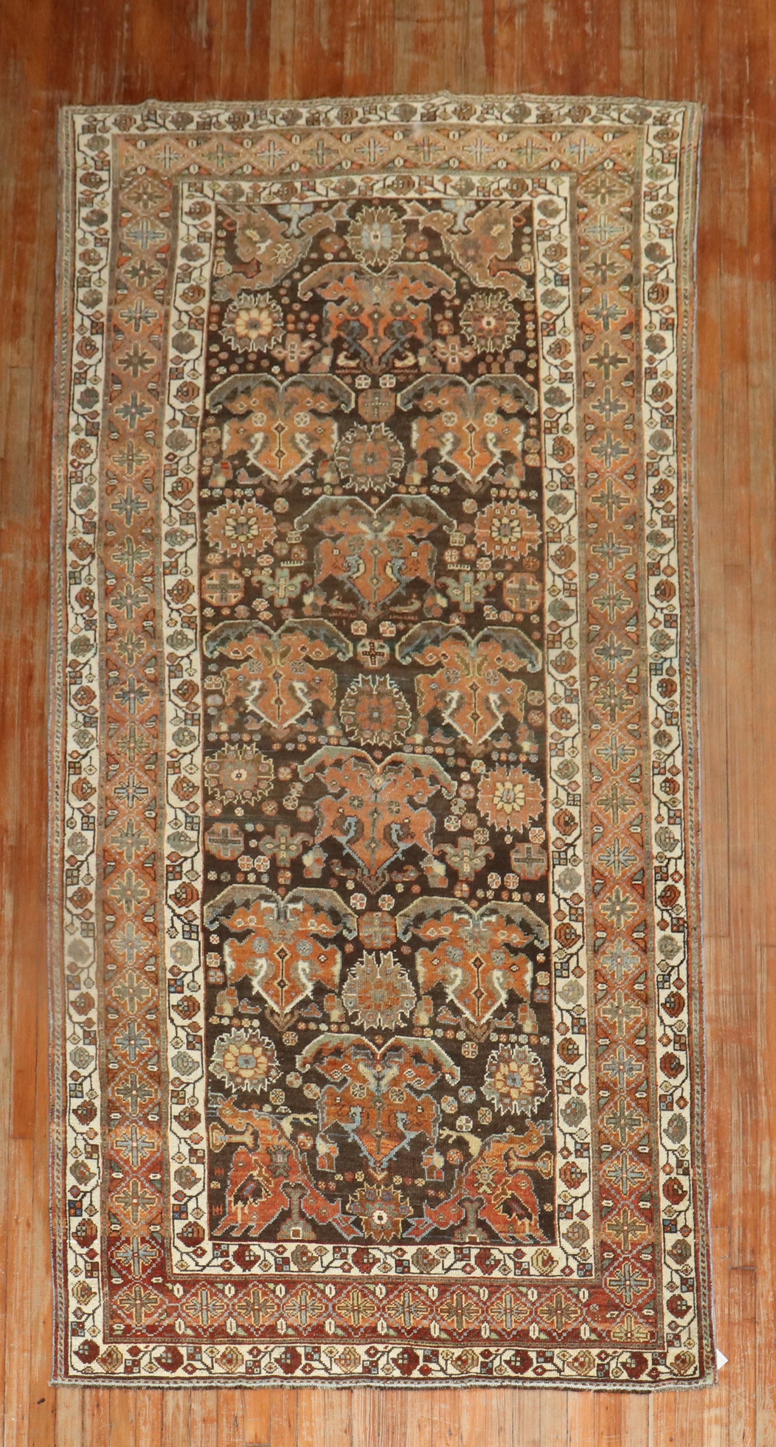 4' 9" x 9' 10" Persian Kurd rug in brown tones: 4' 9" x 9' 10" Persian Kurd rug in brown tones Vintage Persian Kurd rug from the 1930s featuring a tribal design in predominant brown tones. Specifications Type: Kurd Origin: Persian Design: Tribal Er