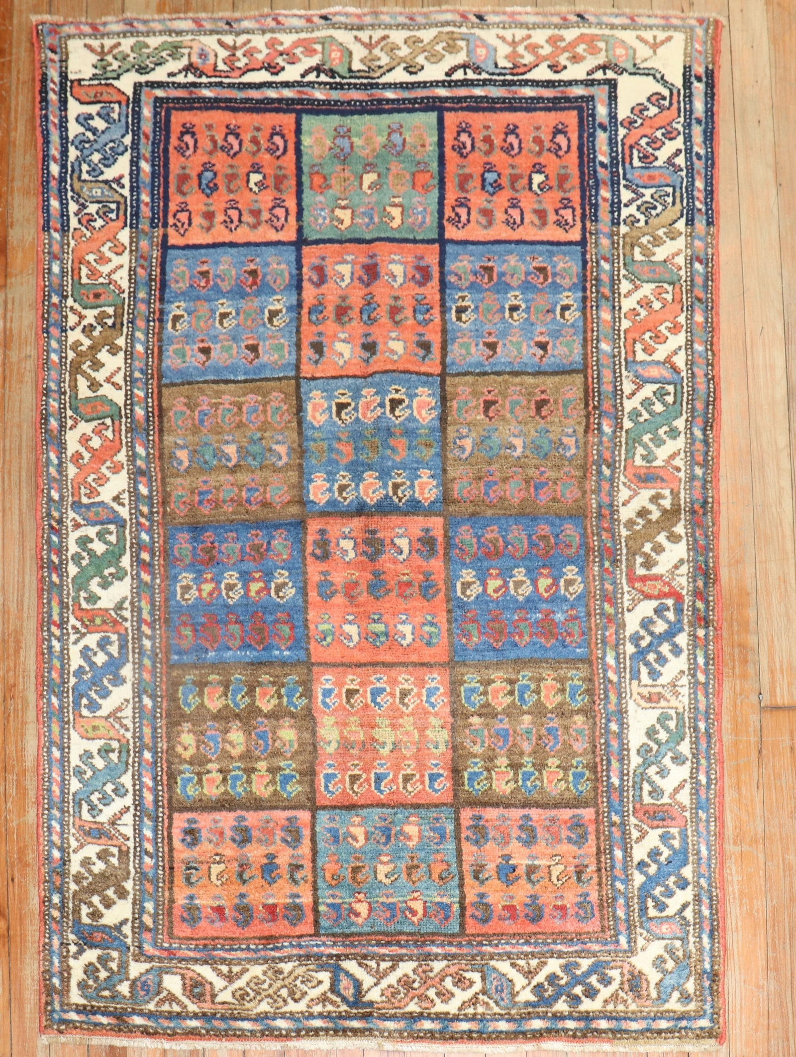 3' 3" x 4' 10" Persian Bakhtiari small rug garden box design: 3' 3" x 4' 10" Persian Bakhtiari small rug garden box design Vintage Persian Bakhtiari rug from the 1940s featuring a classic garden box design. This pre-owned small rug showcases the traditional Bakh