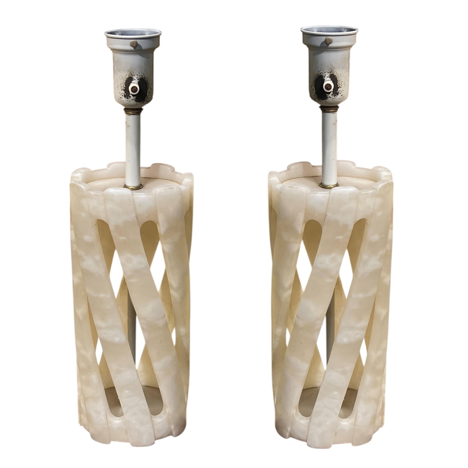 Set of 2 Italian Midcentury Alabaster Hand-Carved Table Lamps: Set of 2 Italian Midcentury Alabaster Hand-Carved Table Lamps This pair of mid-century modern table lamps from the 1950s features finely hand-carved alabaster bodies with a swirling oval cylindrical s