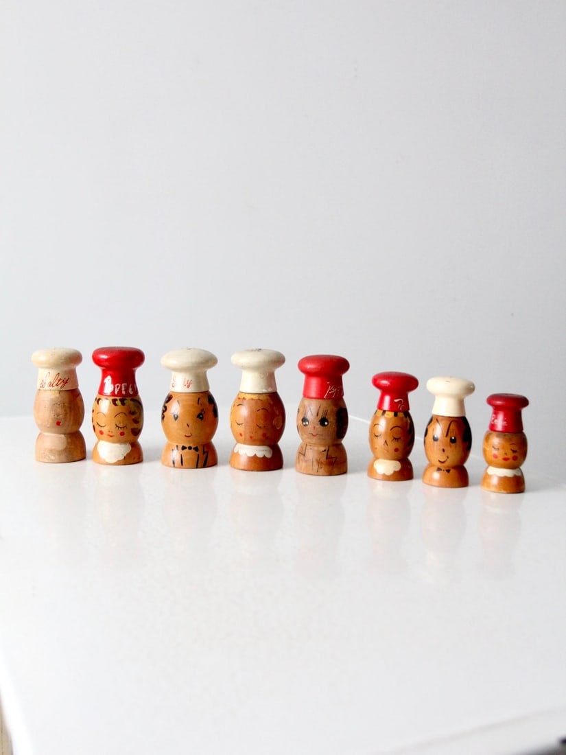 Vintage 1950s Wooden Chef Salt and Pepper Shakers Collection: Vintage 1950s Wooden Chef Salt and Pepper Shakers Collection This charming collection features vintage wooden salt and pepper shakers from the 1950s. Each shaker is designed as a whimsical hand-painte