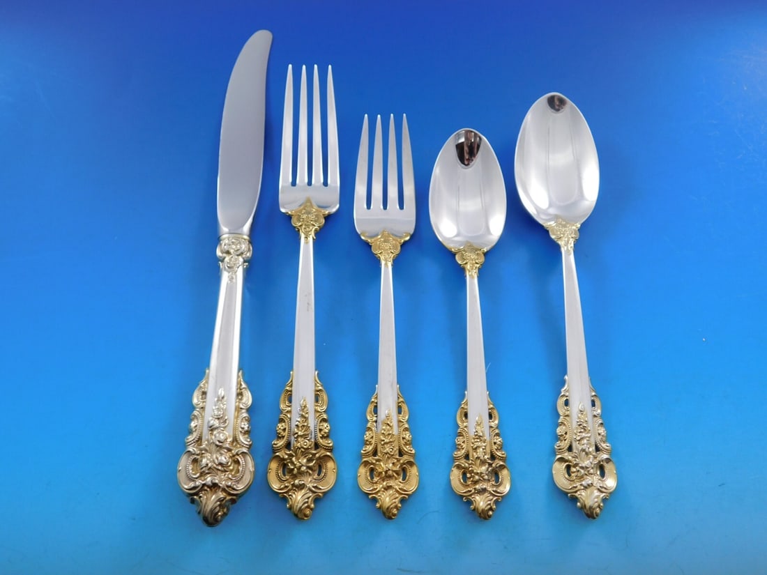 Wallace Grande Baroque Gold Accent Sterling Silver Flatware Set for 12 - 65 Pieces: Wallace Grande Baroque Gold Accent Sterling Silver Flatware Set for 12 - 65 Pieces The Grande Baroque Gold Accent by Wallace Sterling Silver Flatware set is a stunning collection designed for 12, feat