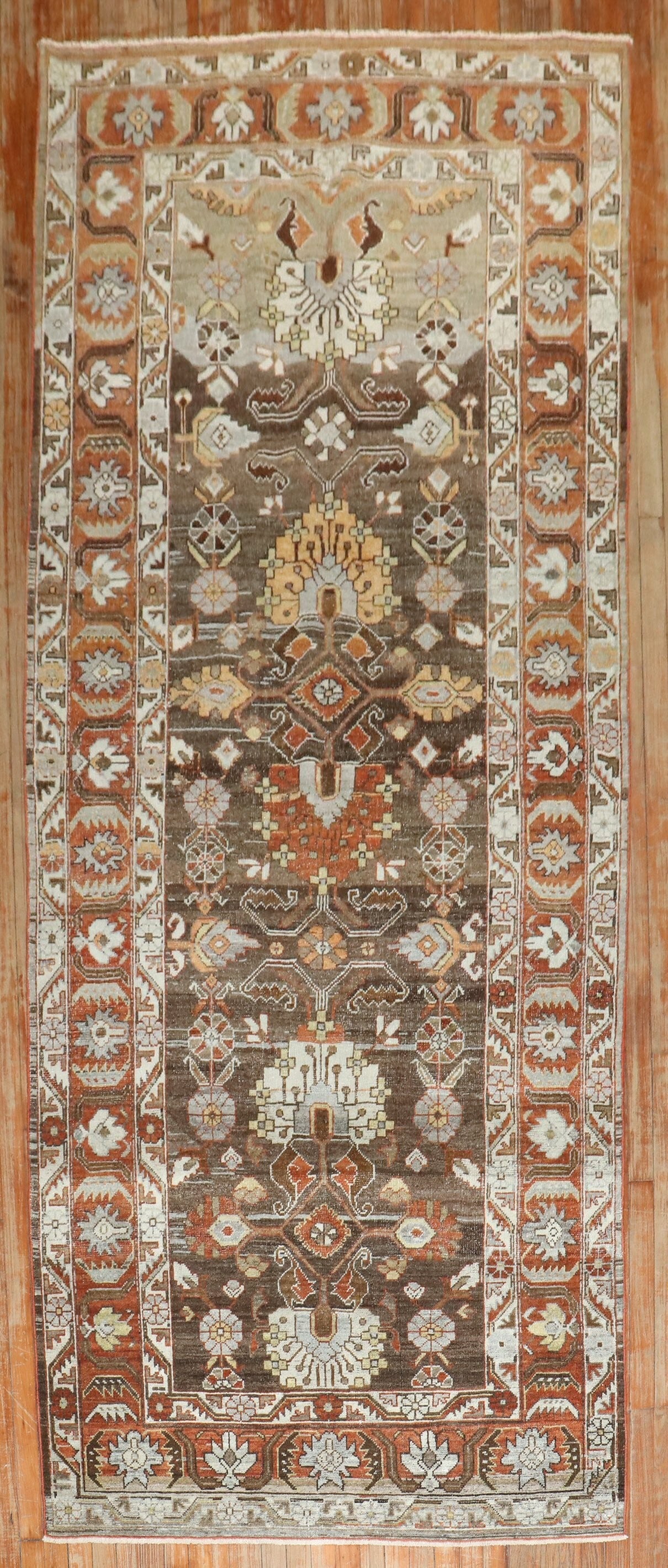 4' 6" x 10' 11" Persian Malayer Brown Runner Rug: 4' 6" x 10' 11" Persian Malayer Brown Runner Rug Early 20th century Persian Malayer runner with an intricate patterned design and a brown-toned palette. This pre-owned rug is identified as a Malayer r