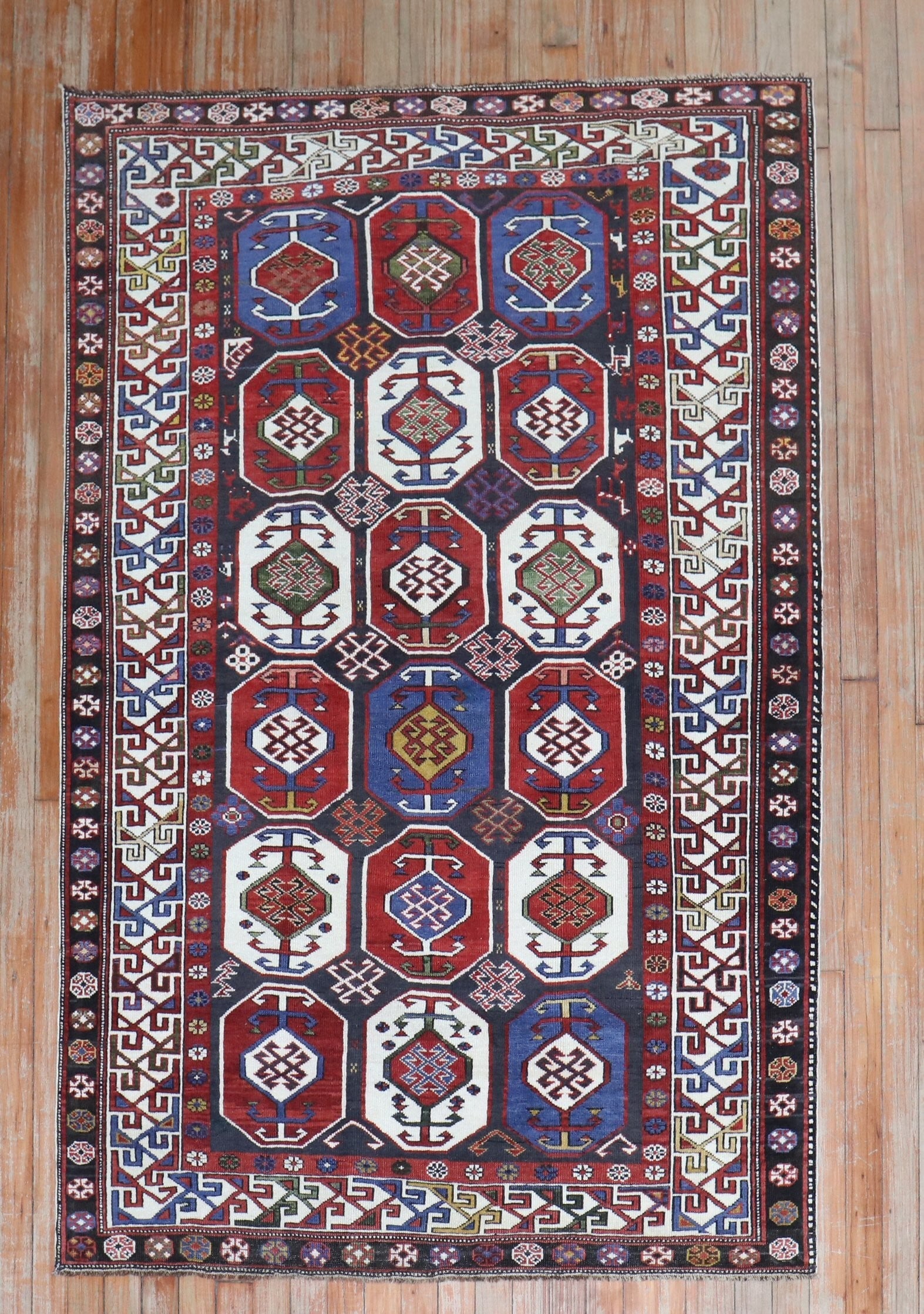 3' 11" x 5' 10" Late 19th Century Caucasian Shirvan Rug: 3' 11" x 5' 10" Late 19th Century Caucasian Shirvan Rug Late 19th century Shirvan Caucasian rug in a small-format size. This pre-owned antique rug is identified as a Caucasian Shirvan piece. Specifica