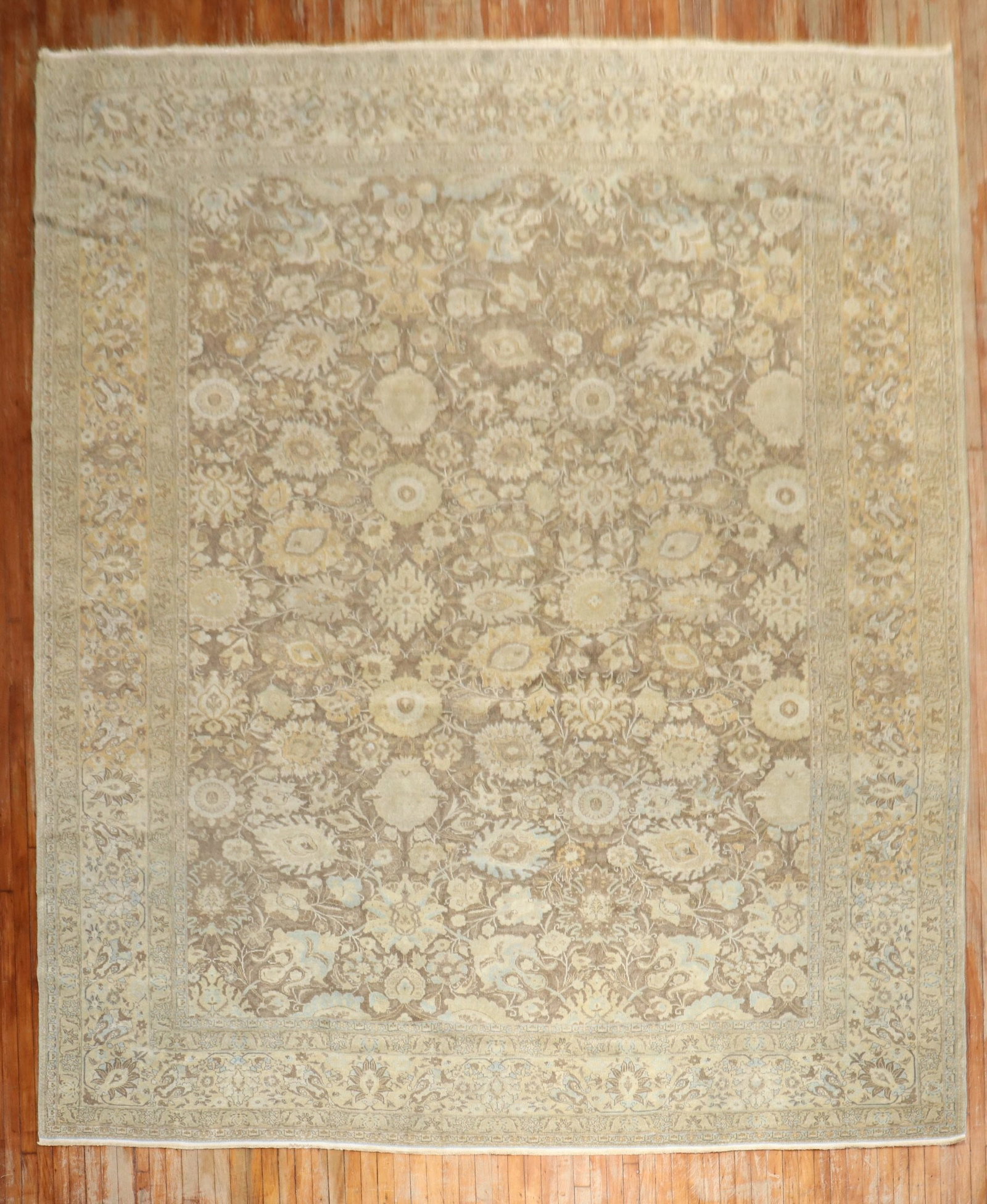 11' 1" x 14' 8" Early 20th Century Persian Tabriz Room Rug: 11' 1" x 14' 8" Early 20th Century Persian Tabriz Room Rug Early 20th century Persian Tabriz decorative rug in butter tones. This pre-owned oversize room rug features the classic Tabriz type and prese