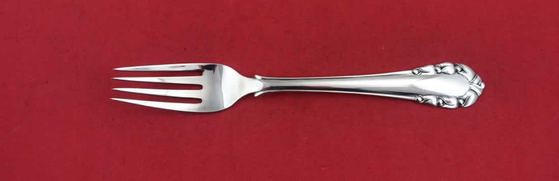Georg Jensen Lily of the Valley Sterling Silver Fork 6 3/4" G.I Mark: Georg Jensen Lily of the Valley Sterling Silver Fork 6 3/4" G.I Mark This exquisite luncheon fork from Georg Jensen features the elegant 'Lily of the Valley' pattern and is crafted from high-quality s