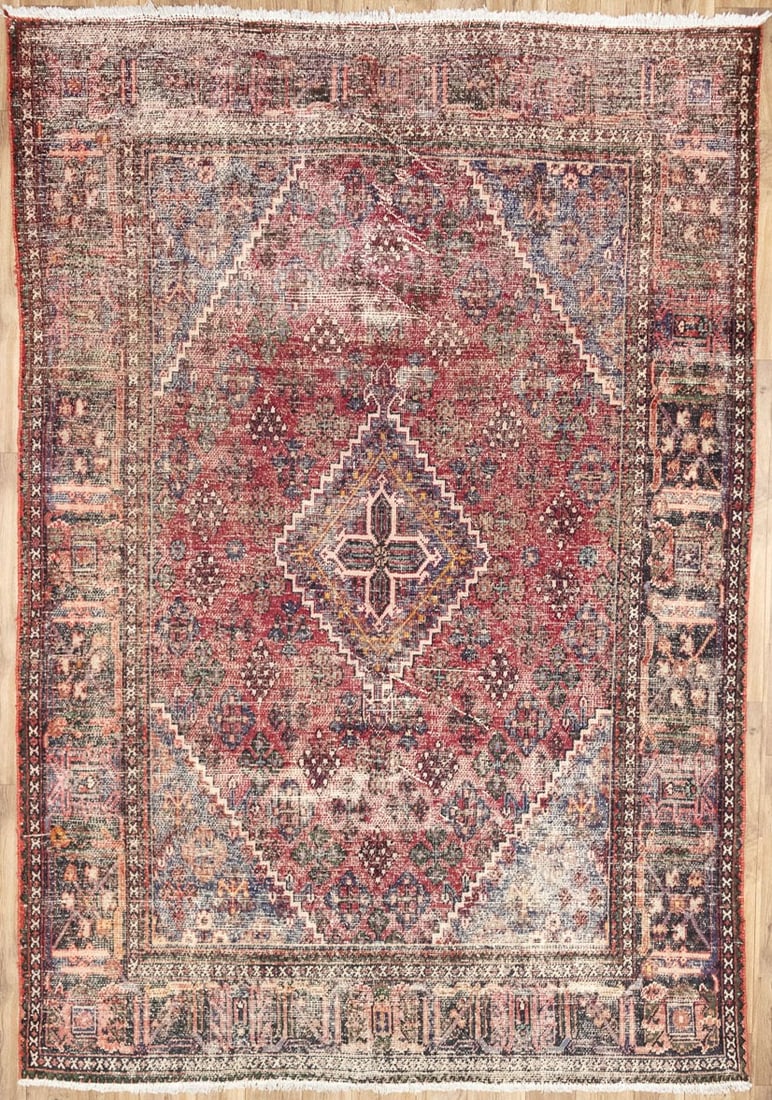 Hand Knotted Wool Floral Oriental Area Rug 6'6 x 9'7: Hand Knotted Wool Floral Oriental Area Rug 6'6 x 9'7 This semi-antique hand-knotted wool rug features a distressed floral pattern in muted shades of red, cream, plum, green, and blue. Crafted in Weste