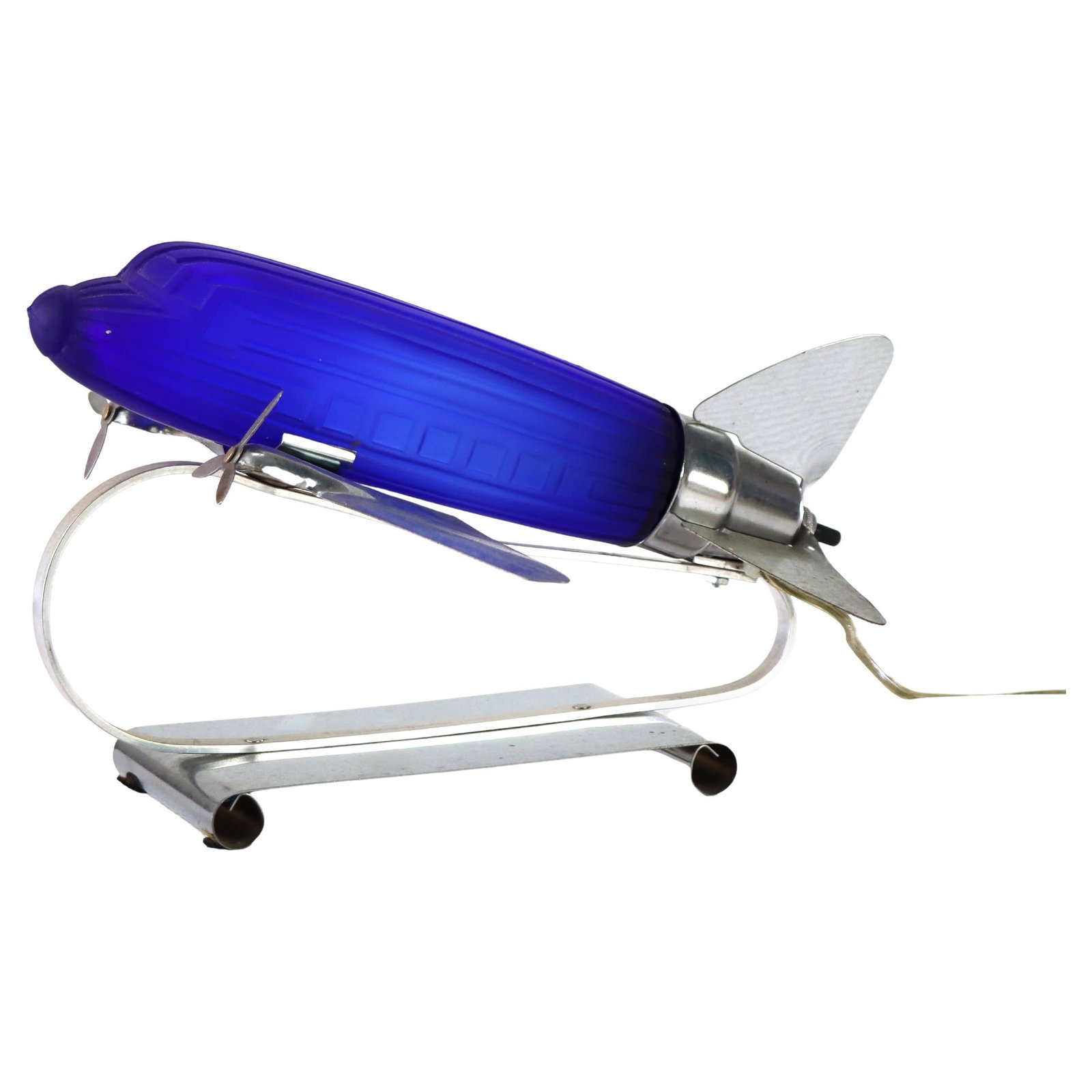 Vintage DC-3 Airplane Table Lamp Cobalt Blue Chrome Accents 1977: Vintage DC-3 Airplane Table Lamp Cobalt Blue Chrome Accents 1977 Illuminate your space with this stunning vintage Art Deco table lamp designed in the iconic shape of a DC-3 airplane. Crafted around 19