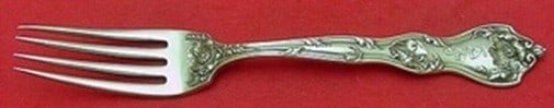 Reed and Barton Intaglio Sterling Silver Dinner Fork 7 7/8": Reed and Barton Intaglio Sterling Silver Dinner Fork 7 7/8" Sterling silver dinner fork in the Intaglio pattern by Reed & Barton. This pre-owned piece is monogrammed, with monograms that may vary, and