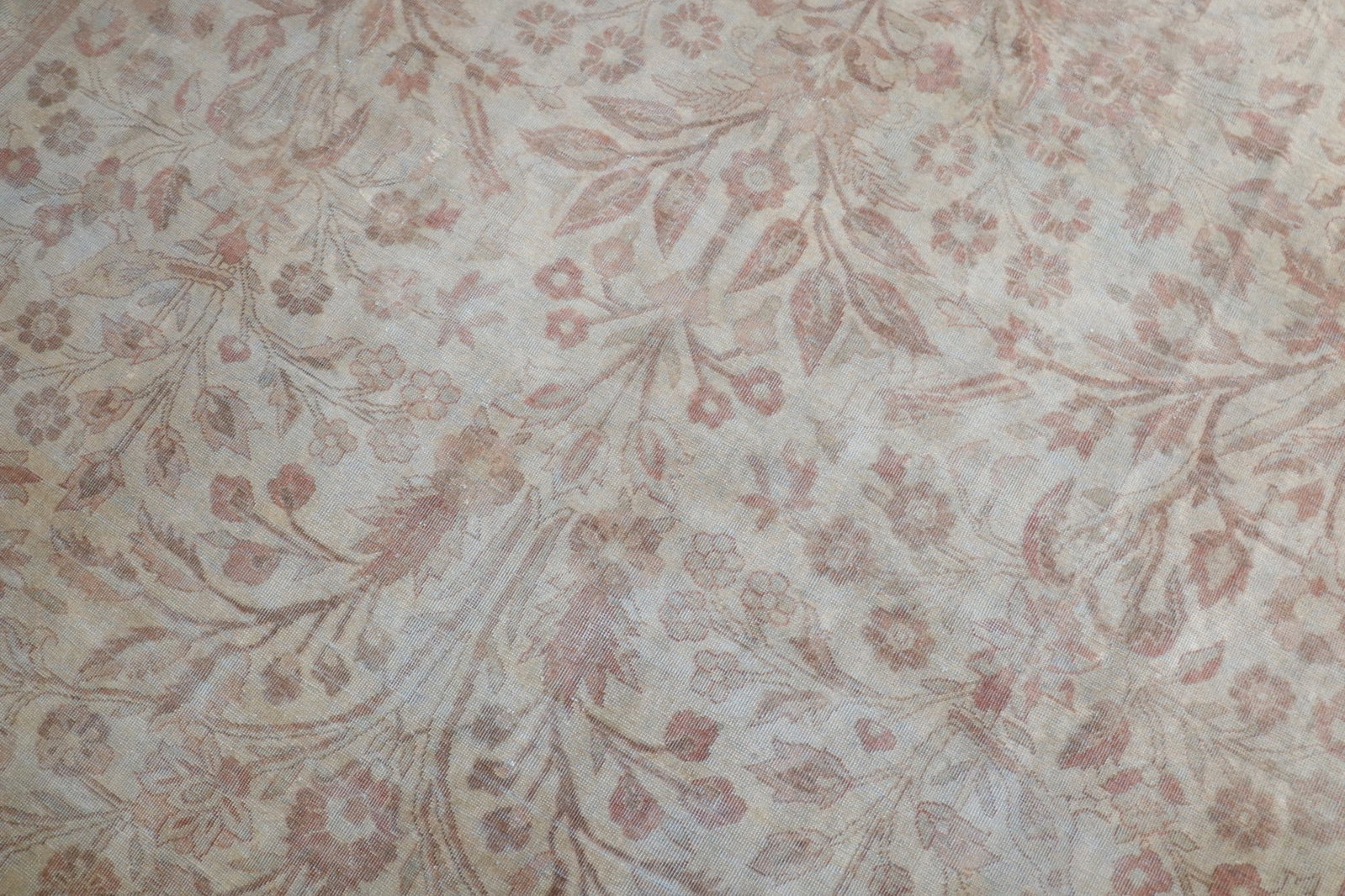 9' 7" x 11' 4" Early 20th Century Amritsar Indian Rug: 9' 7" x 11' 4" Early 20th Century Amritsar Indian Rug Early 20th century Indian Amritsar room-size rug with a pictorial design and shabby chic character. This pre-owned rug features a light-toned fiel
