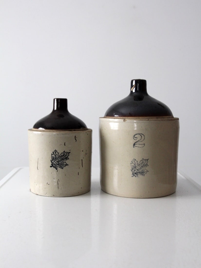 Antique Western Stoneware Jug Set of 2 Rustic Decor: Antique Western Stoneware Jug Set of 2 Rustic Decor This exquisite set of two antique stoneware jugs, crafted by the Western Stoneware Company in the late 1800s, exudes rustic charm and timeless elega