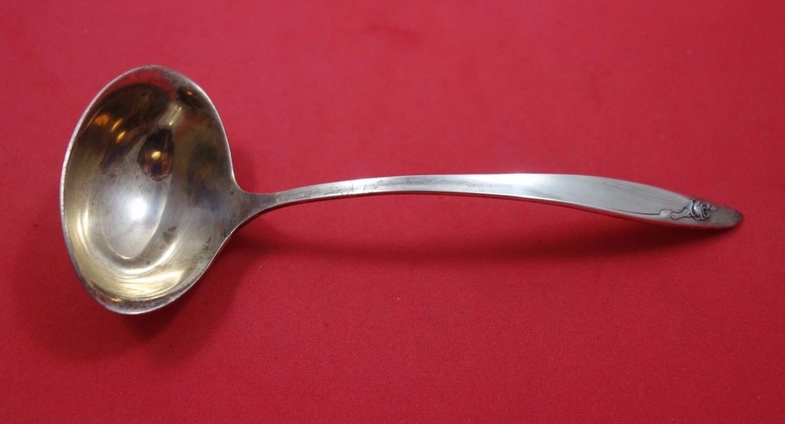 Alvin Eternal Rose Sterling Silver Ladle 6 3/4 in: Alvin Eternal Rose Sterling Silver Ladle 6 3/4 in Sterling silver gravy ladle in the Eternal Rose pattern by Alvin. This pre-owned piece is not monogrammed and is in excellent condition. Specification