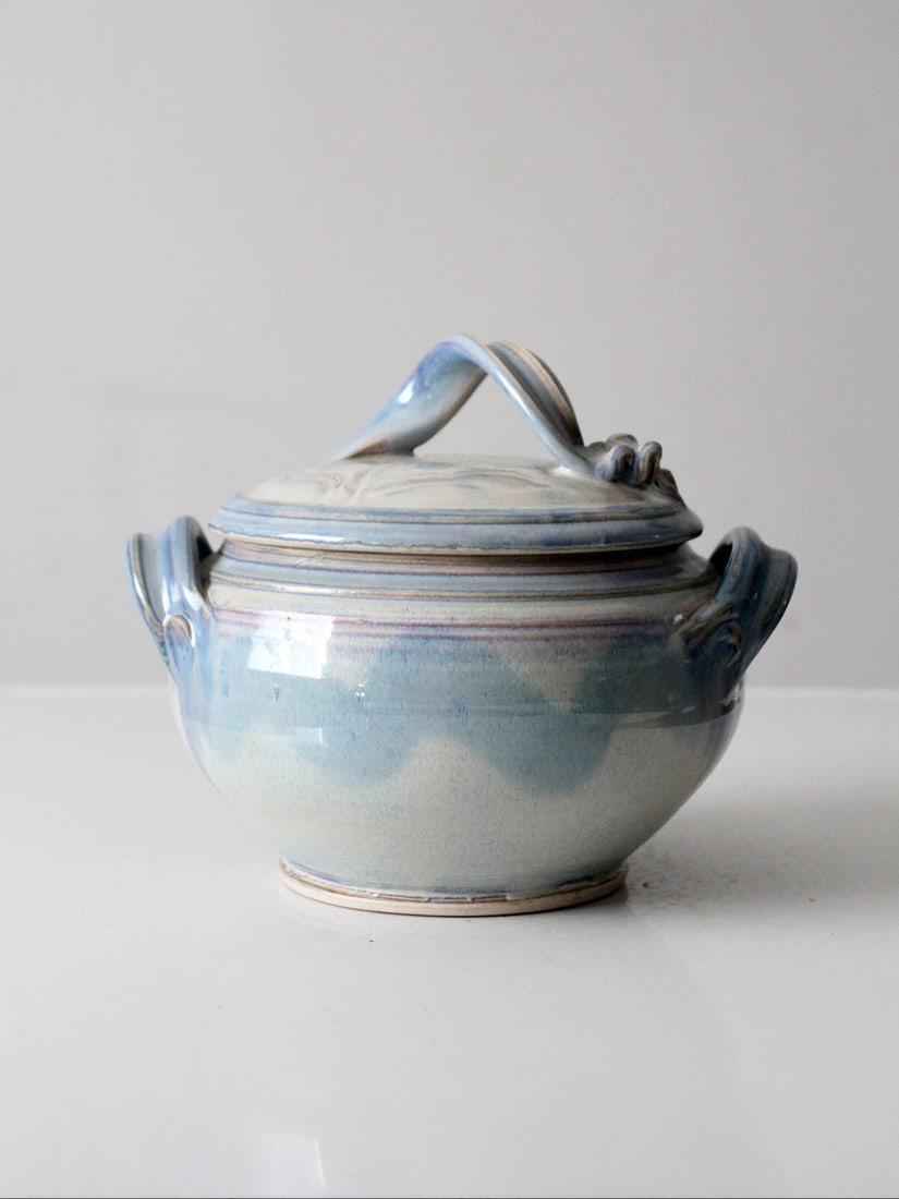 Signed Studio Pottery Lidded Bowl Blue Gray Glaze 10 in: Signed Studio Pottery Lidded Bowl Blue Gray Glaze 10 in This vintage studio pottery bowl features a lidded design with a soft blue-gray glaze and a sculptural, refined form. Subtle variations in the g