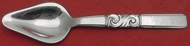 Georg Jensen Scroll Sterling Silver Melon Spoon 5 3/4": Georg Jensen Scroll Sterling Silver Melon Spoon 5 3/4" This exquisite sterling silver melon spoon, crafted by Georg Jensen, showcases the elegant Scroll pattern. Measuring 5 3/4" in length, this piece