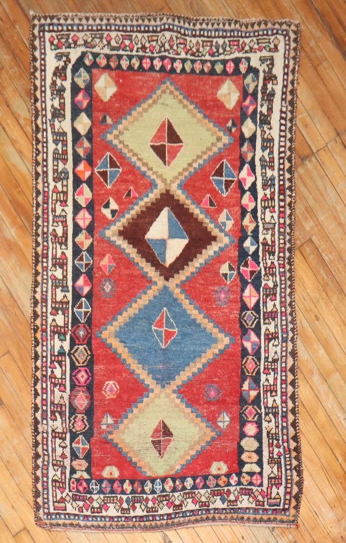 3' 2" x 5' 9" Early 20th Century Persian Gabbeh Tribal Rug: 3' 2" x 5' 9" Early 20th Century Persian Gabbeh Tribal Rug Early 20th century Persian Gabbeh rug with a colorful tribal design and distressed antique character. This pre-owned small rug is described a