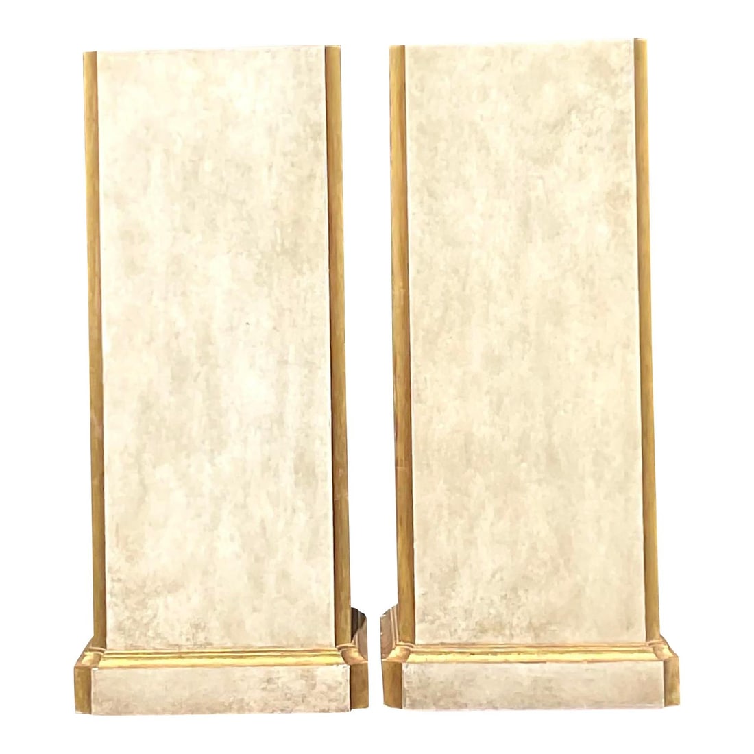 Pair of Vintage Regency Gilt Tipped Pedestals in Eggshell Finish: Pair of Vintage Regency Gilt Tipped Pedestals in Eggshell Finish Presenting a stunning pair of vintage Regency pedestals, exuding elegance and style. These tall pedestals feature a charming patinated 
